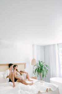 Cama ou camas em um quarto em Olisa Hotel Boutique