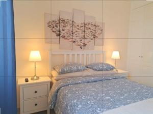 A bed or beds in a room at San Andres Beach View Apartment