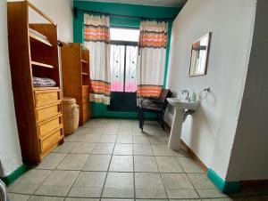 Ein Etagenbett oder Etagenbetten in einem Zimmer der Unterkunft Hostal Mixteco Naba Nandoo