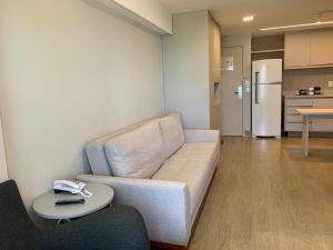 A kitchen or kitchenette at Flat Hotel à Beira Mar Recife by Direct