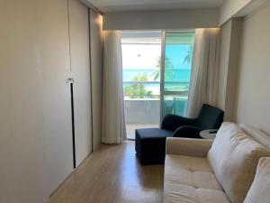 A seating area at Flat Hotel à Beira Mar Recife by Direct