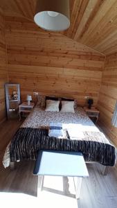 Postel nebo postele na pokoji v ubytování Las cabañas de Tino