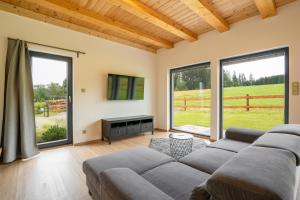 Χώρος καθιστικού στο Apartmány Na šumavské louce