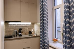 Η κουζίνα ή μικρή κουζίνα στο YOU & RIGA Central, Specious, Superior Apartment, Brand New