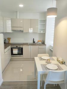 Kuchyň nebo kuchyňský kout v ubytování New apartment - MEMO - Le Locle