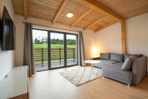 Χώρος καθιστικού στο Apartmány Na šumavské louce