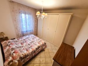 Postel nebo postele na pokoji v ubytování Piccolo Rifugio