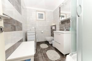 Kúpeľňa v ubytovaní Apartments Klisovic