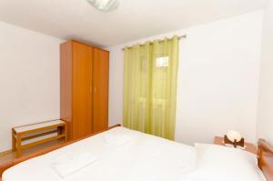 Posteľ alebo postele v izbe v ubytovaní Apartments Klisovic