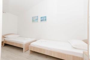 Posteľ alebo postele v izbe v ubytovaní Apartments Klisovic
