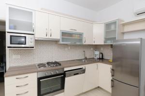 Kuchyňa alebo kuchynka v ubytovaní Apartments Klisovic