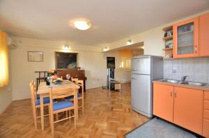 Kuchyň nebo kuchyňský kout v ubytování Apartment Visnja