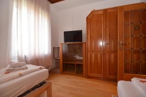 Łóżko lub łóżka w pokoju w obiekcie PM-APART Ries Rosina
