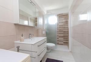 Koupelna v ubytování Apartments Nada + 33 fotografií