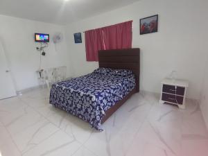 Postel nebo postele na pokoji v ubytování Apartamento amueblado, Res Blue Amber N3
