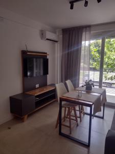 TV a/nebo společenská místnost v ubytování Serranos Apart