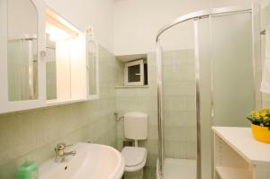 Kúpeľňa v ubytovaní Apartments Romina