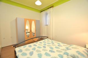Posteľ alebo postele v izbe v ubytovaní Apartments Romina