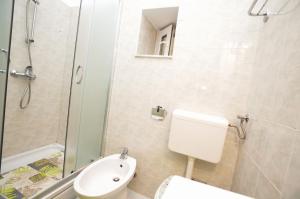 Kúpeľňa v ubytovaní Apartments Romina