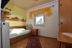 Łóżko lub łóżka w pokoju w obiekcie PM-APART Ries Rosina
