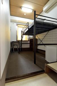 Ein Bett oder Betten in einem Zimmer der Unterkunft Juyoh Hotel