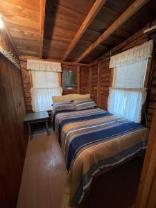 Ένα ή περισσότερα κρεβάτια σε δωμάτιο στο SWALLOW - LIMIT 4 cottage