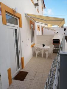 Balkón nebo terasa v ubytování CASA DA PRAIA DA POÇA - APARTAMENTO TULIPA