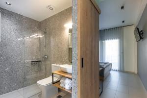 Kúpeľňa v ubytovaní Araliki Suites