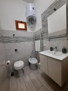 Łazienka w obiekcie MADACHI APPARTAMENTI