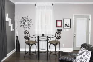 a dining room with a table and chairs at Adair Park Bungalow in Atlanta