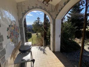 an entrance to a house with an archway at Cozy holiday home in Paldau in a charming area in Paldau