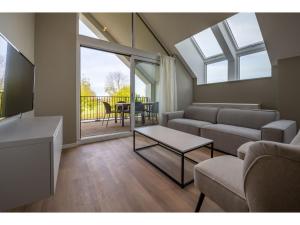 Μια τηλεόραση ή/και κέντρο ψυχαγωγίας στο Stylish Marina Loft w Balcony