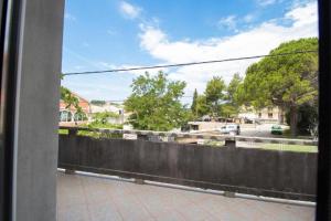 Ein Balkon oder eine Terrasse in der Unterkunft Apartment Sanja