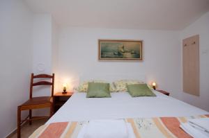 Posteľ alebo postele v izbe v ubytovaní Apartments Jasminka