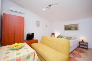 Posteľ alebo postele v izbe v ubytovaní Apartments Jasminka