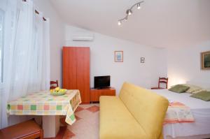 Posteľ alebo postele v izbe v ubytovaní Apartments Jasminka
