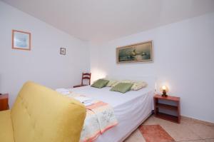 Posteľ alebo postele v izbe v ubytovaní Apartments Jasminka
