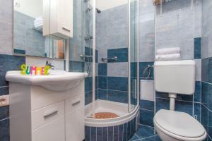 Koupelna v ubytování Apartments Mira