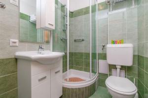 Koupelna v ubytování Apartments Mira