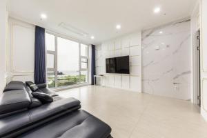 TV a/nebo společenská místnost v ubytování Gladsheim Hotel