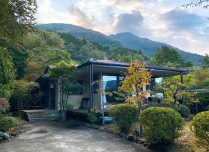 a house with a view of a mountain at EK House Hakone Shushinso 箱根修身荘 in Onsensō