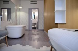 Vonios kambarys apgyvendinimo įstaigoje Hotel le Lapin Blanc