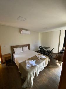 Postel nebo postele na pokoji v ubytování Trakai Suites