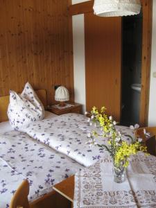 Postel nebo postele na pokoji v ubytování Haus Steinlechner