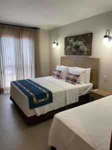 Katil atau katil-katil dalam bilik di Suites Quinta Santa Barbara