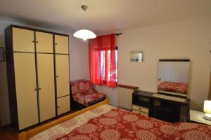 Postel nebo postele na pokoji v ubytování Apartments Nevenka
