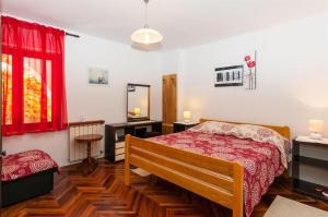 Postel nebo postele na pokoji v ubytování Apartments Nevenka