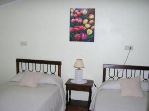 Una cama o camas en una habitación de House - 3 Bedrooms with WiFi - 00075