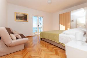 Posteľ alebo postele v izbe v ubytovaní Apartments Jasna