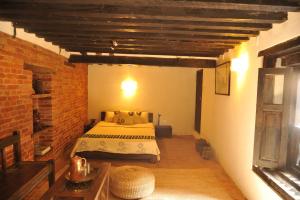 Letto o letti in una camera di Peacock Guest House